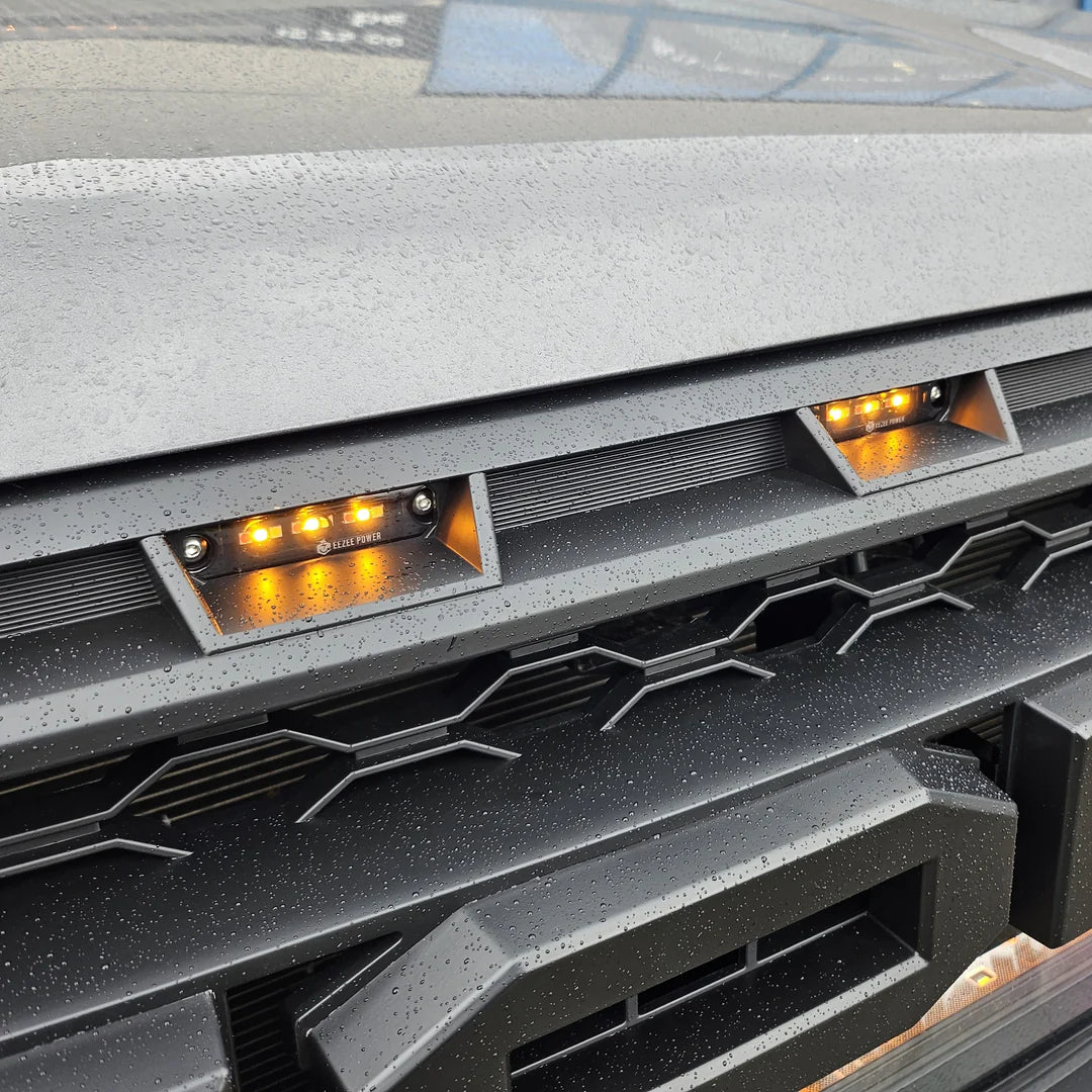 Éclairage LED Shadow Vision EEZEE POWER pour calandre avant, 3 couleurs, design moderne et lumineux.