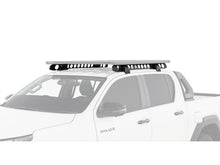 Système Backbone sans perçage RHINO-RACK sur Toyota Hilux, galerie présentée à titre illustratif