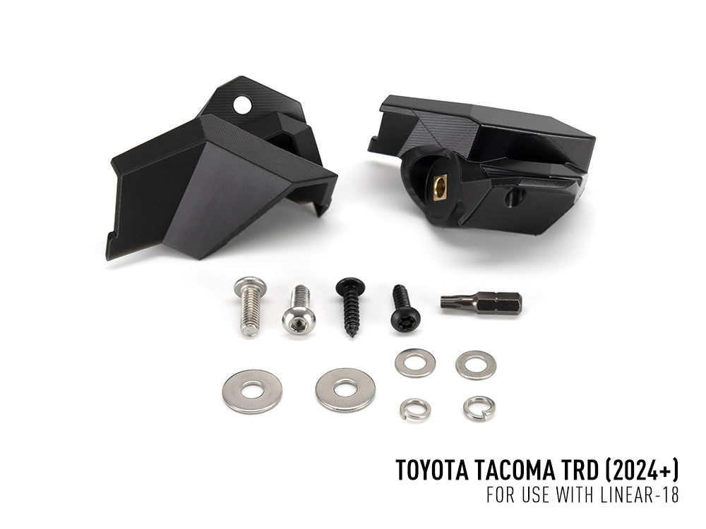 Pack LED calandre LAZER LAMPS pour Toyota Tacoma TRD 2024+ avec feux LED intégrés, montage sur la calandre du véhicule.